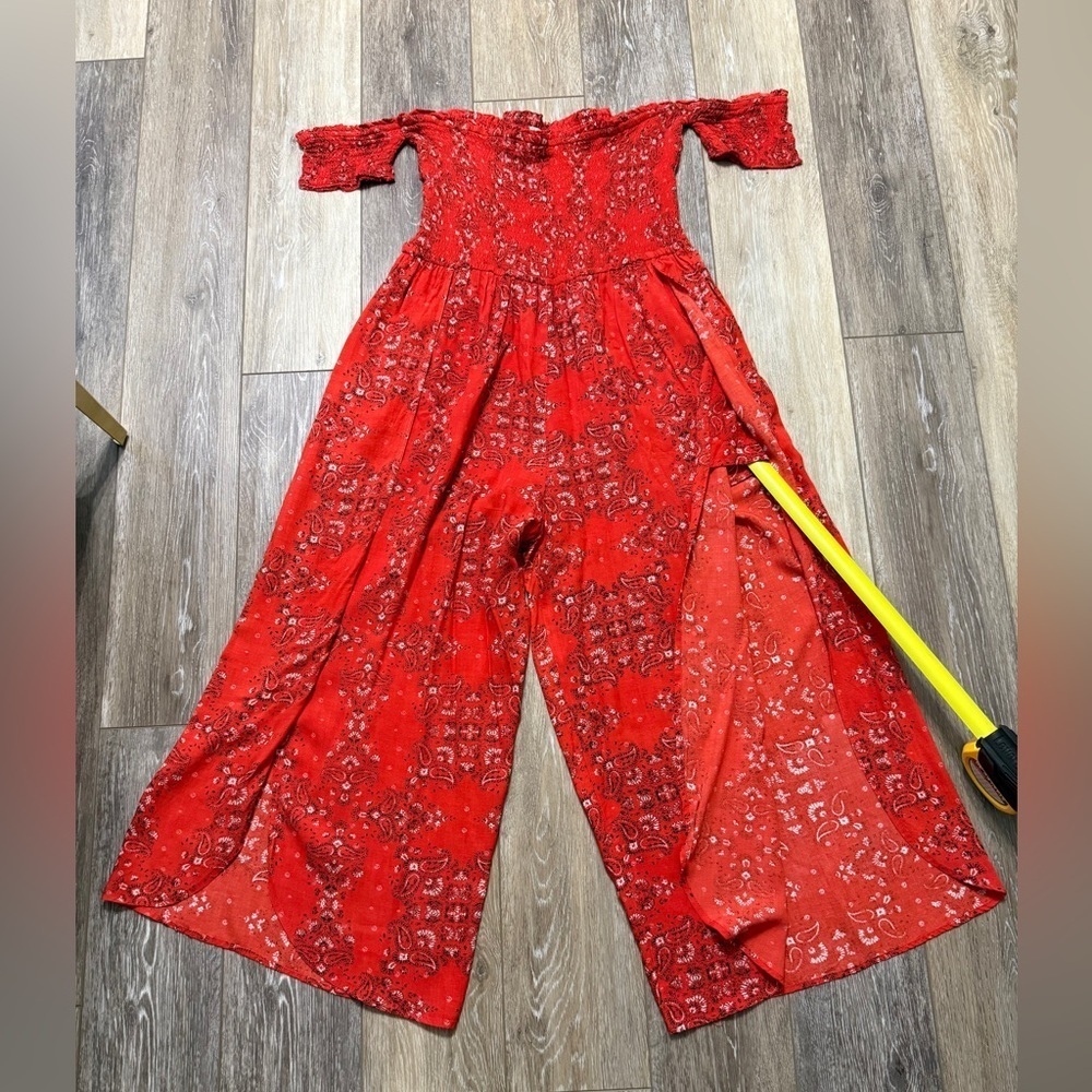 #11)  Rebellion Open leg jumpsuit size Large